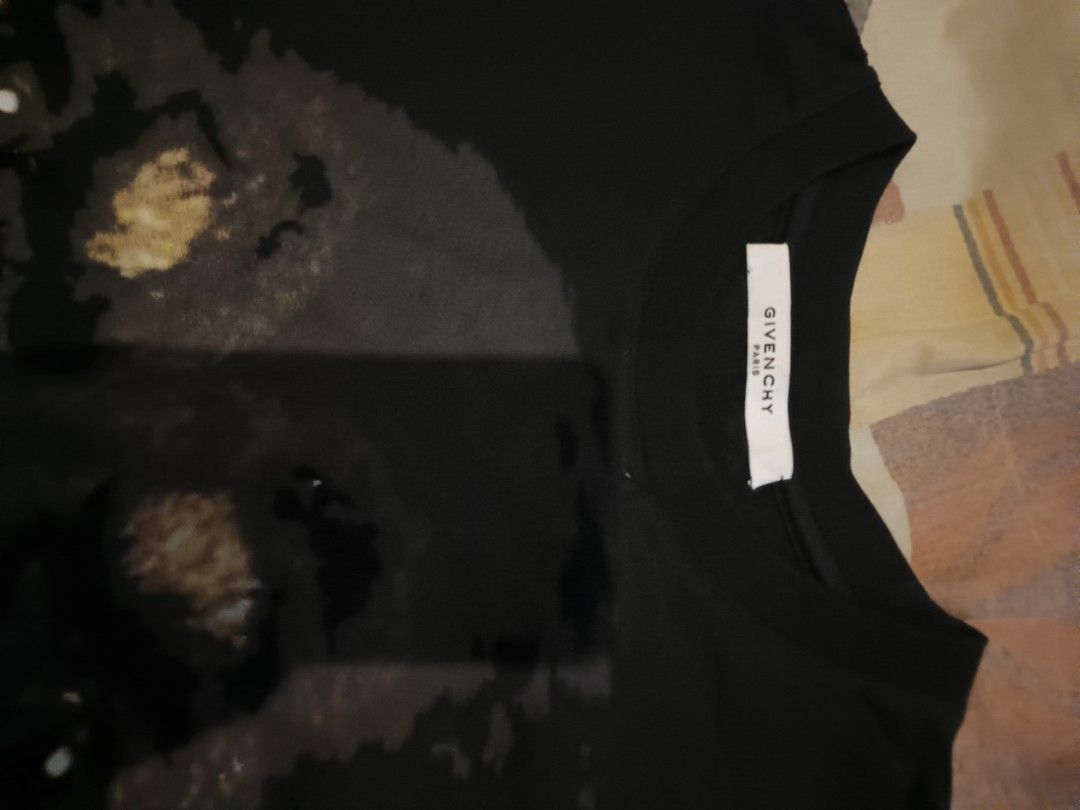 Givenchy Rootweeller graphic tshirt (Category: Activewear) located in Odiongan. Submitted by thriftngo26 (Listing ID 1471116405, Image 2). Description: This is a black Givenchy Rottweiler T-Shirt from the iconic Riccardo Tisci era..