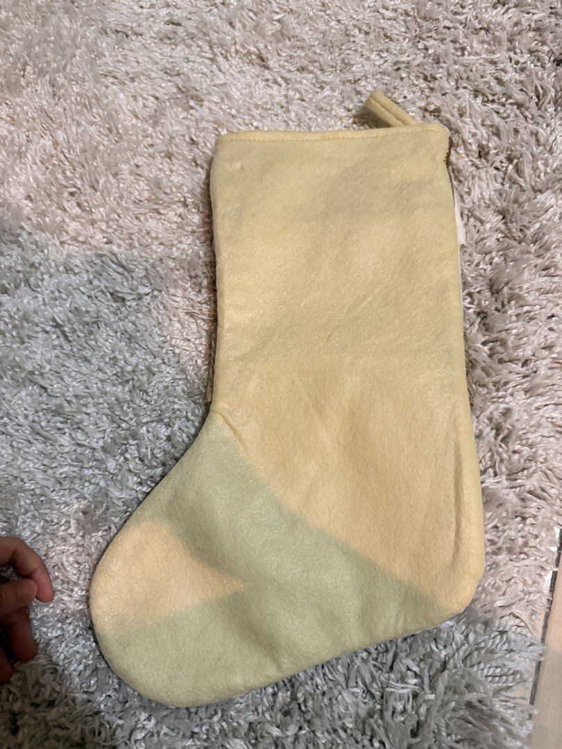 Gold and White Snowman Christmas Stocking (Category: Character Goods) located in Mandaluyong City. Submitted by riz_040521 (Listing ID 1470976019, Image 3). Description: - Festive snowman design with elegant gold and white metallic details - Features a sparkling sequin floral cuff, shimmering gold scarf, and cute button accents - Solid light-colored backing for a clean look -selling for 280.