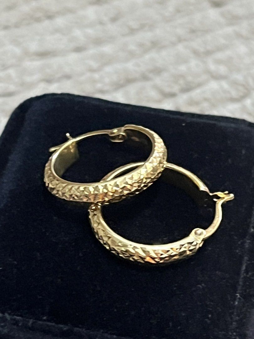 Gold Textured Hoop Earrings (Category: Earrings) located in Manila. Submitted by missyoung222 (Listing ID 1470993714, Image 1). Description: 18K Saudi Gold Hoop Earrings Diacut Design 2.27 grams 19mm.