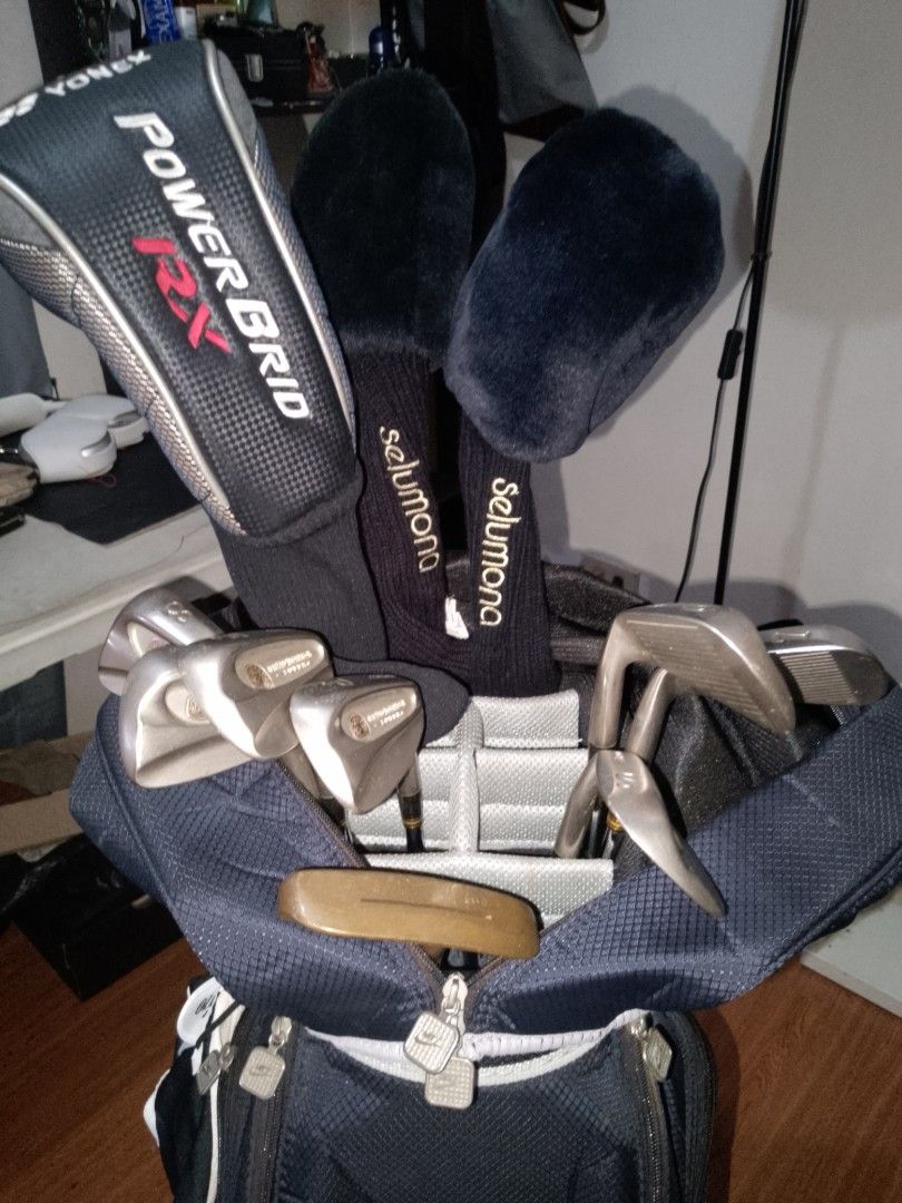 Golf Set Mizuno and Dunlop complete (Category: Golf) located in Manila. Submitted by jgonzales236 (Listing ID 1470965032, Image 1). Description: - Complete golf set in a black Nike bag - Mizuno Zoid 11.5-degree titanium driver - Dunlop 13-degree utility club - PRGR wood, plus assorted irons and putters - Includes Selumona and Yonex power grid headcovers - Clubs have normal scratches and scuffs from regular play - Great starter bundle for hitting 