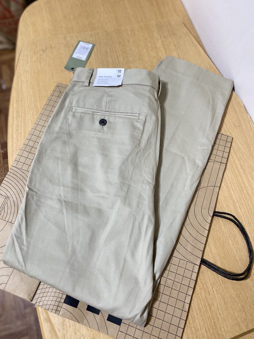 Goodfellow & Co Slim Trouser Khaki Size 32x32 (Category: Other Bottoms) located in Batangas. Submitted by lux_kimmy (Listing ID 1470966622, Image 2). Description: - Brand: Goodfellow & Co - Style: Slim trouser with tapered leg - Size: 32x32 - Color: Khaki - Condition: Brand new with tags (BNWT) - Material: Comfortable stretch fabric - Original Retail Price: $35.00.