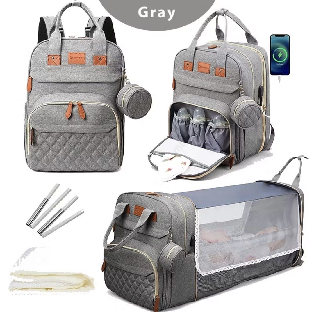 Gray Multifunctional Diaper Bag Backpack with Crib (Category: Diaper Bags & Wetbags) located in Quezon City. Submitted by shop.hannderella (Listing ID 1471038984, Image 1). Description: - Brand: Gray Sunshine - 2-in-1 Design: Converts from a stylish diaper backpack into a portable baby bed with a mesh canopy - Storage: Multiple internal compartments to organize all baby essentials - Pockets: Includes dedicated bottle pockets and a convenient smal
