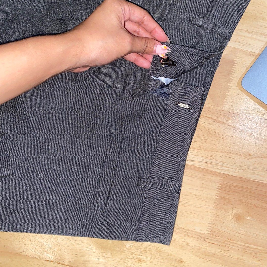 Grey mini skirt with belt loops and zip closure (Category: Skirts) located in Cavite. Submitted by helloize (Listing ID 1471097097, Image 2). Description: 26in waistline With inner shorts .