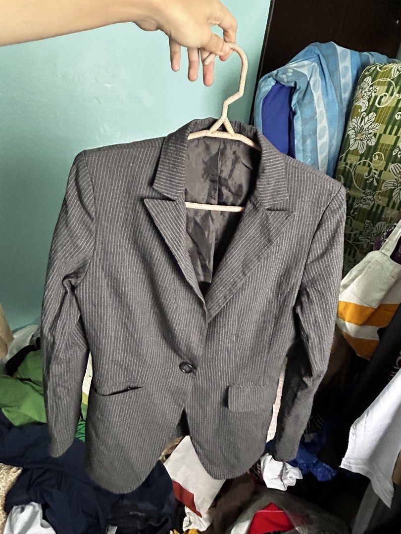 Grey Pinstripe Formal Blazer Suit Jacket (Category: Coats, Jackets and Outerwear) located in Manila. Submitted by lovely.453 (Listing ID 1470960359, Image 1). Description: - Style: Grey blazer with subtle white pinstripes size small to medium - Fit: Tailored fit with structured shoulders - Features: Single-button closure, two front pockets, and lined interior - Occasion: Ideal for office wear and formal events - Condition: Good overall condition,