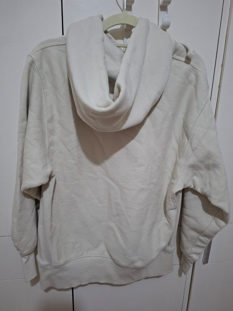 GU Cream beige pullover hoodie with front pocket and drawstrings (Category: Coats, Jackets and Outerwear) located in Paranaque City. Submitted by potatoiceblended (Listing ID 1471049891, Image 2). Description: - Color: Cream beige - Material: Super cozy and thick - Design: Front kangaroo pocket - Details: Thick drawstrings with metal eyelets - Fit: Ribbed cuffs and hem to maintain shape - Style: Solid neutral color that matches everything.