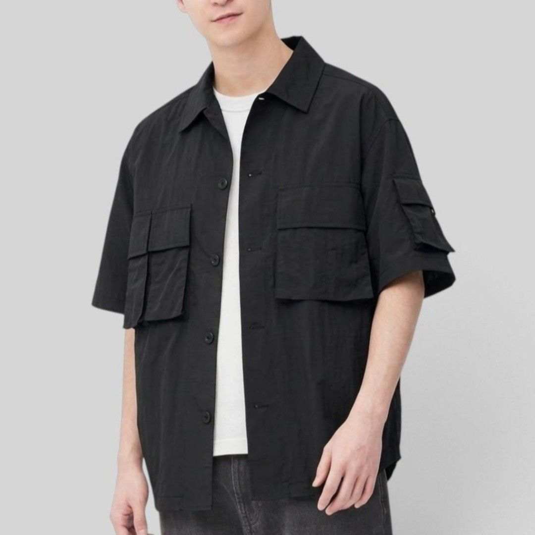 GU Multi-Pocket Oversized Short Sleeve Shirt (Category: Tshirts & Polo Shirts ) located in Quezon City. Submitted by oldturnedtogold (Listing ID 1471087461, Image 2). Description: GU Multi-Pocket Oversized Short Sleeve Shirt Size Small (fits like Medium) Black Shoulder Width - 22" Body length - 29" Chest Width - 23" Sleeve Length - 11" Details: - lightweight nylon fabric - oversized fit - 3 chest pocket, 1 sleeve pocket - can be worn as a top or 