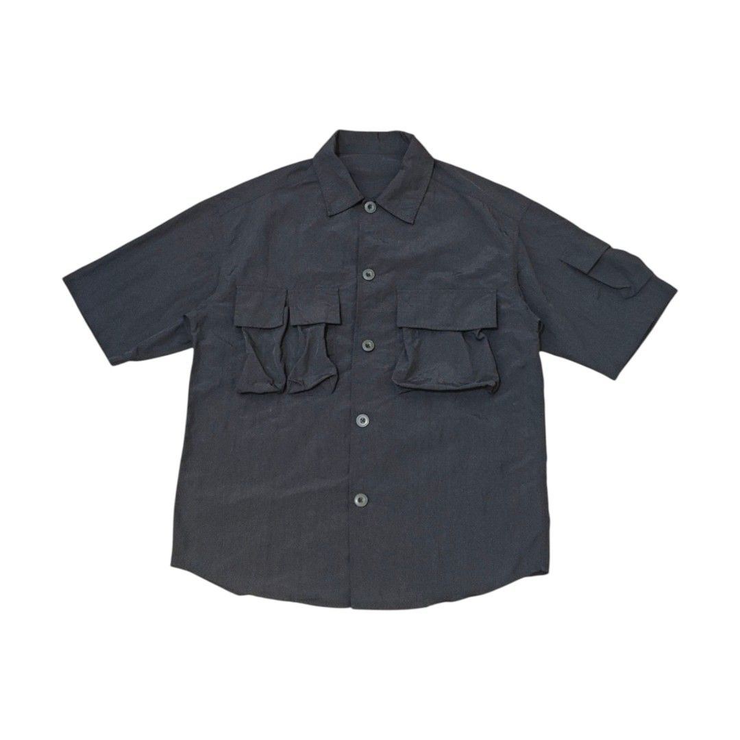 GU Multi-Pocket Oversized Short Sleeve Shirt (Category: Tshirts & Polo Shirts ) located in Quezon City. Submitted by oldturnedtogold (Listing ID 1471087461, Image 1). Description: GU Multi-Pocket Oversized Short Sleeve Shirt Size Small (fits like Medium) Black Shoulder Width - 22" Body length - 29" Chest Width - 23" Sleeve Length - 11" Details: - lightweight nylon fabric - oversized fit - 3 chest pocket, 1 sleeve pocket - can be worn as a top or 