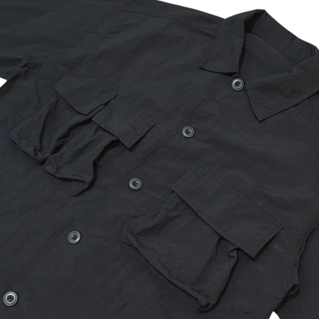 GU Multi-Pocket Oversized Short Sleeve Shirt (Category: Tshirts & Polo Shirts ) located in Quezon City. Submitted by oldturnedtogold (Listing ID 1471087461, Image 3). Description: GU Multi-Pocket Oversized Short Sleeve Shirt Size Small (fits like Medium) Black Shoulder Width - 22" Body length - 29" Chest Width - 23" Sleeve Length - 11" Details: - lightweight nylon fabric - oversized fit - 3 chest pocket, 1 sleeve pocket - can be worn as a top or 