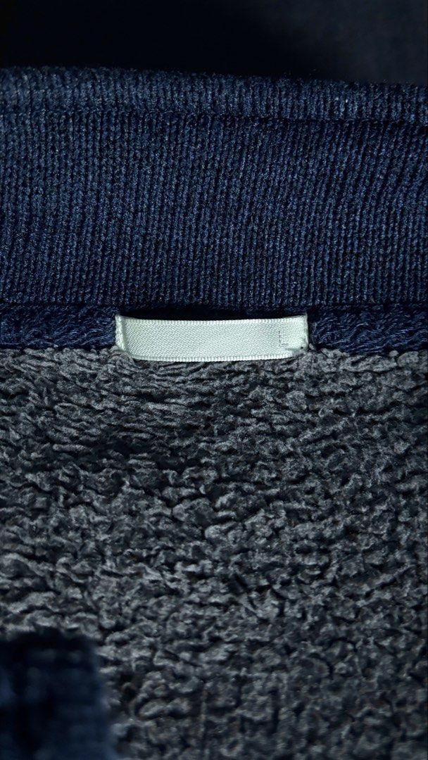 GU Navy Blue Zip Up Fleece Jacket (Category: Coats, Jackets and Outerwear) located in Bacoor. Submitted by calvinmanzano13 (Listing ID 1470967965, Image 2). Description: - L = 26” | W = 20.5” - Exterior: Ribbed knit texture - Interior: Soft fleece lining - Features: High collar, full zipper, two front snap-button pockets - Condition: Clean inside and out - Style: Great casual layering piece for cooler weather Notes: 🔥 Hand washed 🔥 Polished 🔥 