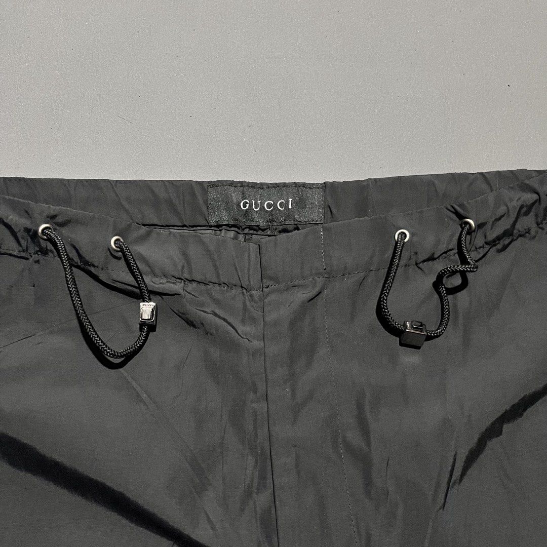 Gucci - Tom Ford - Nylon Capri Pants (Category: Luxury Apparel) located in Bacolod City. Submitted by rndm.wears (Listing ID 1471045968, Image 3). Description: Gucci by Tom Ford Nylon Capri Pants Garterized Drawstrings waist Side Hem Zippers Gucci Tab on back Waistline: 32 when loose can fit upto 25 Length: 25.5 Like new no issues authentic .