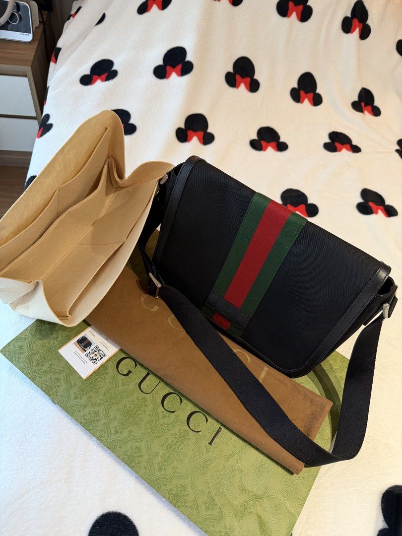 Gucci Black Canvas (Category: Sling Bags) located in Makati City. Submitted by lambogirl (Listing ID 1470875326, Image 3). Description: ✔️Gucci Black Canvas Techno Web Flap Messenger Bag (Model 630921). ✔️Like new condition ✔️free shipping or pick up (Makati) ✔️comes with strap, dust bag, entrupy, and bnew paper bag.
