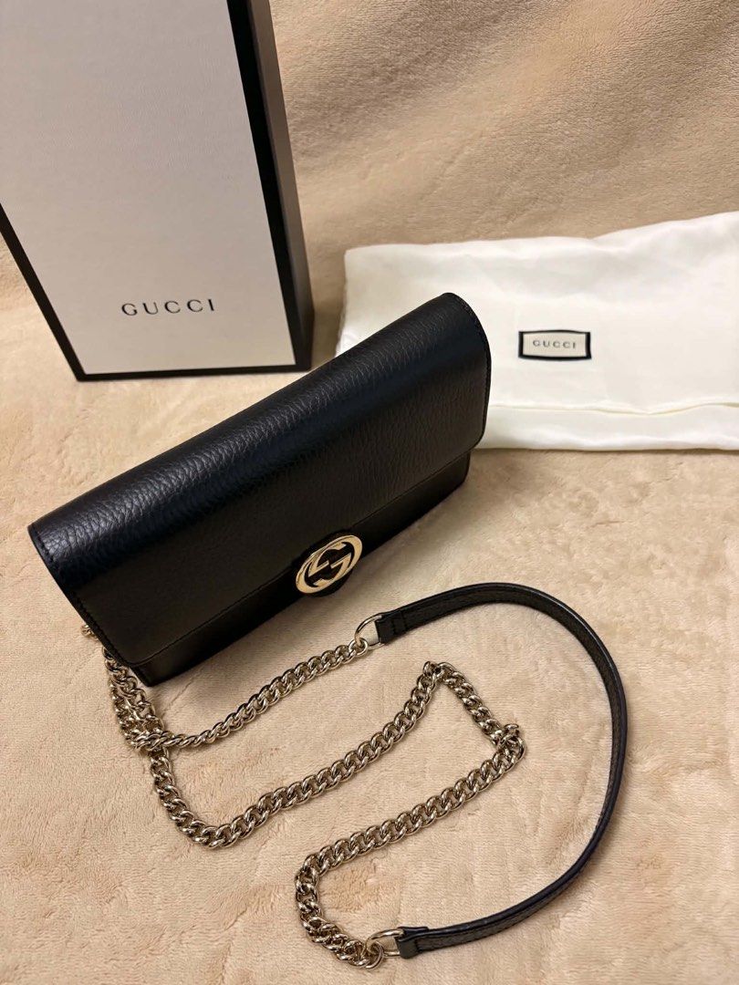 Gucci Black Leather Wallet on Chain Bag (Category: Luxury Bags & Wallets) located in Manila. Submitted by dianaalcar03441 (Listing ID 1471022848, Image 2). Description: - Authentic Gucci bag in black grained leather with luxurious gold-toned hardware - Features the iconic interlocking G closure for a classic look - Comfortable chain strap equipped with a leather shoulder guard - Well-organized interior complete with a zipped compartment and multi