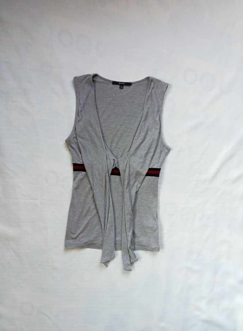Gucci front self tie knot sleeveless top (Category: Sleeveless) located in Bagabag. Submitted by thrift_stories96 (Listing ID 1471095986, Image 3). Description: Gucci front self tie knot sleeveless top Xsmall on tag fits small frame Length - 23 Width - 14.5 stretch up to 16 Condition - excellent No flaw.