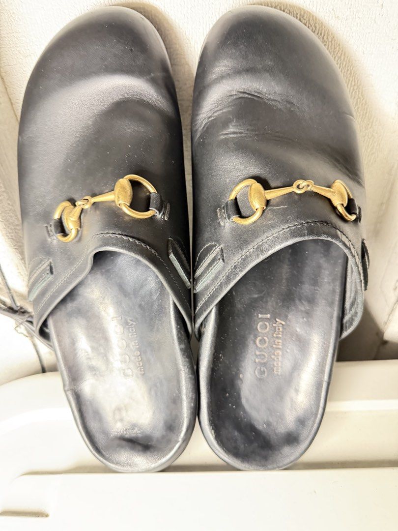 Gucci Mens River Horsebit Clogs (Category: Sneakers & Footwear) located in Quezon City. Submitted by arterg (Listing ID 1470935817, Image 2). Description: Store bought Gucci Store Amsterdam Airport 5 years ago Mens 9 Bought it €800 selling super low because i cut the straps and its well used. This specific closed-toe style blends classic equestrian design codes with everyday luxury lounge or business casual wear. Material: Premium black smooth ca