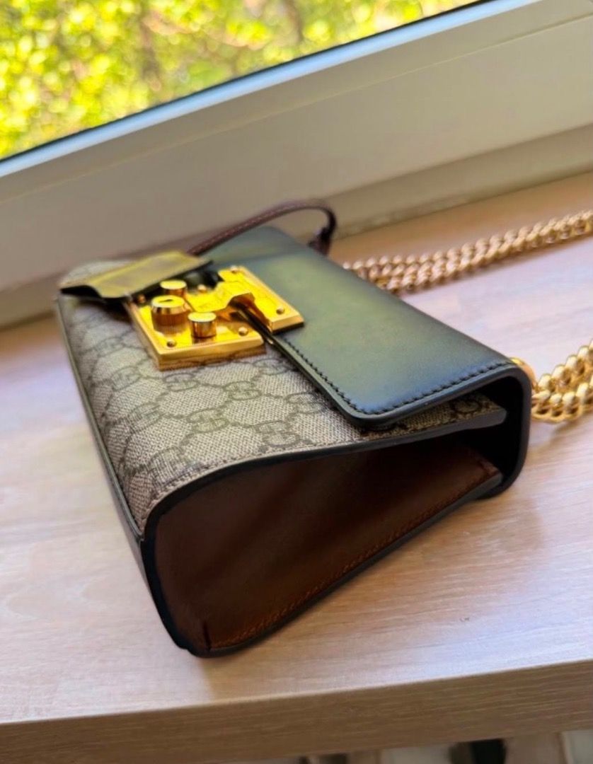 Gucci Padlock GG Supreme Small Shoulder Bag (Category: Luxury Bags & Wallets) located in Manila. Submitted by lovelimmm (Listing ID 1471045755, Image 3). Description: - Authentic Gucci Padlock shoulder bag - Crafted from signature GG Supreme canvas - Features black leather top flap and brown leather gussets - Elegant gold-tone hardware with secure key lock closure - Stylish and convenient chain strap - Compact, structured shape with an interior s