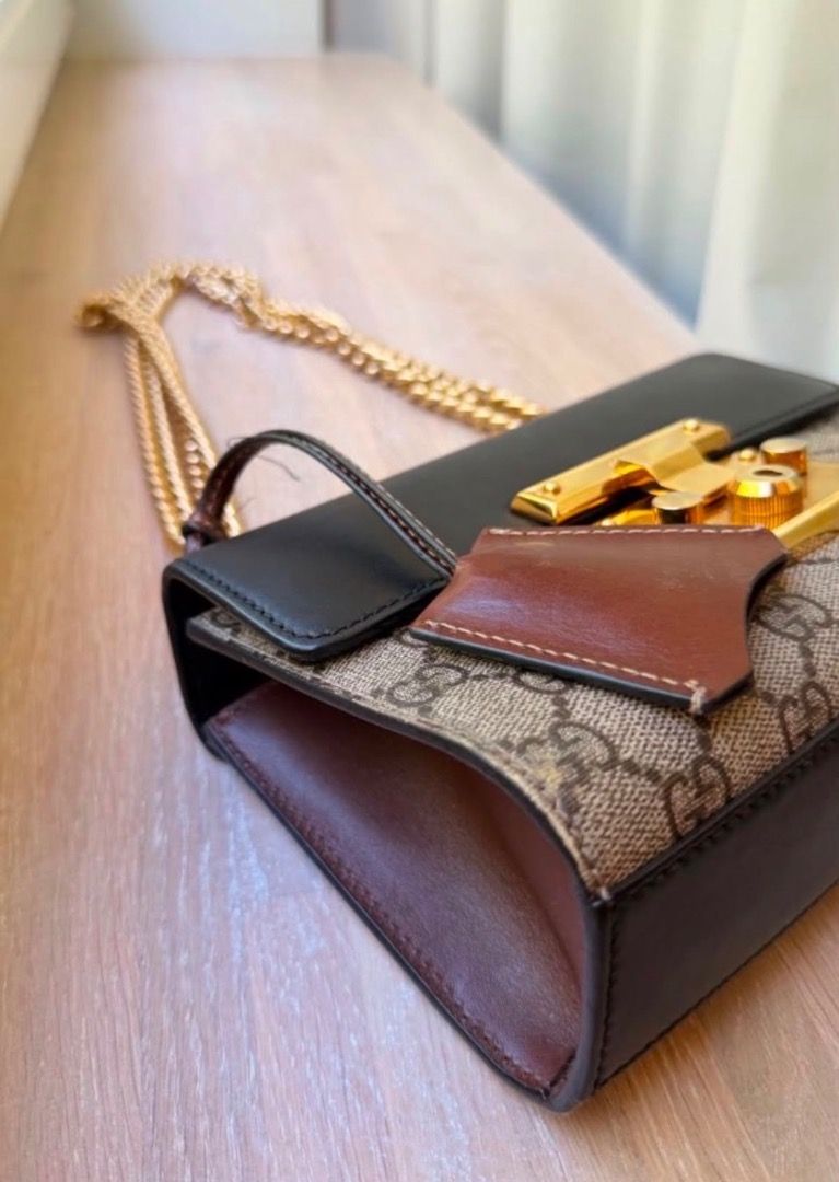 Gucci Padlock GG Supreme Small Shoulder Bag (Category: Luxury Bags & Wallets) located in Manila. Submitted by lovelimmm (Listing ID 1471045755, Image 2). Description: - Authentic Gucci Padlock shoulder bag - Crafted from signature GG Supreme canvas - Features black leather top flap and brown leather gussets - Elegant gold-tone hardware with secure key lock closure - Stylish and convenient chain strap - Compact, structured shape with an interior s