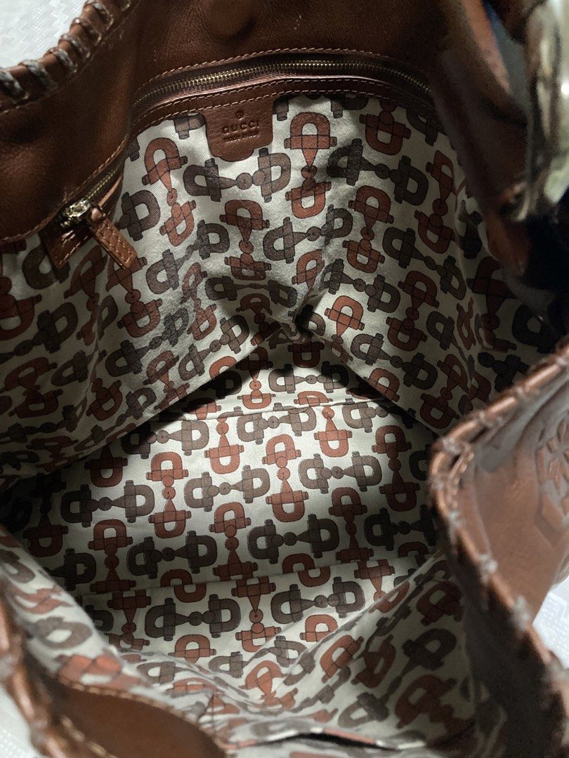 Gucci Pelham GUCCISSIMA HOBO BAG (Category: Luxury Bags & Wallets) located in Dapitan. Submitted by thrift_archive2026 (Listing ID 1471040790, Image 3). Description: 𝐆𝐮𝐜𝐜𝐢 𝐏𝐞𝐥𝐡𝐚𝐦 𝐆𝐮𝐜𝐜𝐢𝐬𝐬𝐢𝐦𝐚 𝐇𝐨𝐛𝐨 𝐁𝐚𝐠 𝐢𝐧 𝐫𝐢𝐜𝐡 𝐛𝐫𝐨𝐰𝐧 𝐞𝐦𝐛𝐨𝐬𝐬𝐞𝐝 𝐥𝐞𝐚𝐭𝐡𝐞𝐫 - Released during the Frida Giannini era (2000s–mid-2010s), this rare collector’s edition stands out for its detailed heraldic shields featuring the Gucci Crest (knig