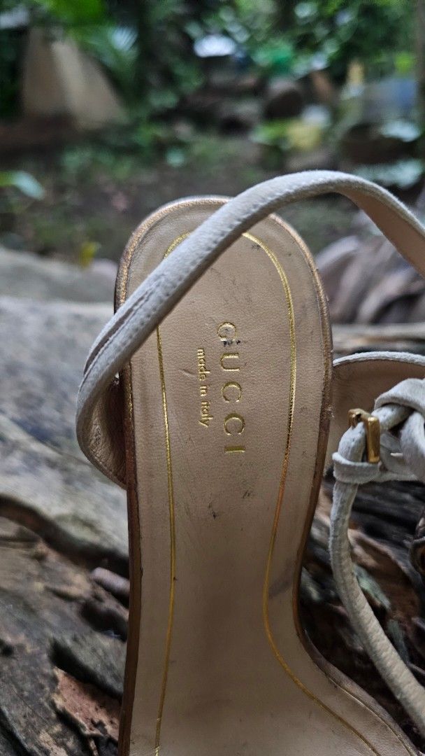 Gucci Python Print High Heel Sandals Size 35 (Category: Heels) located in Kibawe. Submitted by Thrift_ni_Babac (Listing ID 1471034019, Image 2). Description: - Gucci High Heels - Size: 35 (Made in Italy) - Design: Python snakeskin front strap, cream ankle straps, and metallic gold heels - Details: Gold Gucci logo stamp on beige insole - Condition: Visible wear on soles, with some scratches and scuffs on the metallic heels.