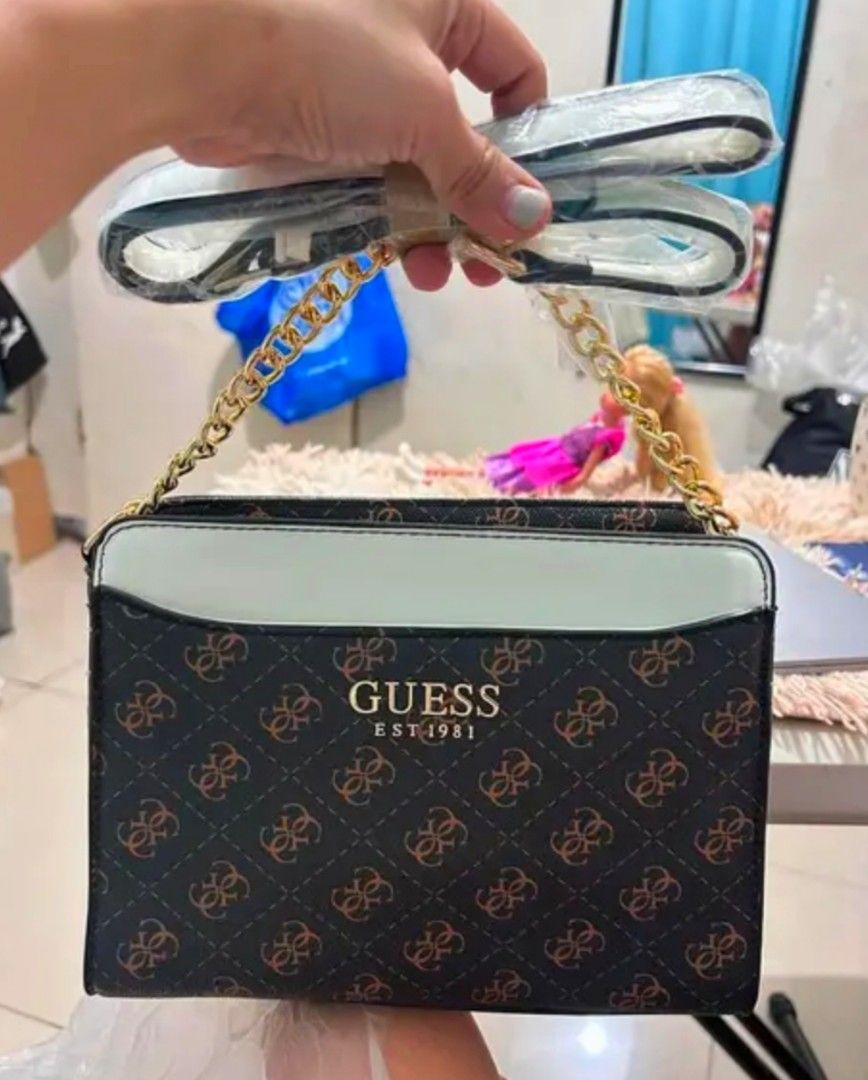 Guess Est 1981 Monogram Shoulder Bag (Category: Shoulder Bags) located in Davao. Submitted by leideclutter (Listing ID 1470958311, Image 1). Description: Selling my brand new Original Guess shoulder/ cross body bag. Made i Thailand mall pull-out. RFS: too small for me .