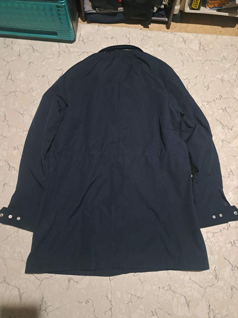 Guess Navy Long Coat Jacket Waterproof Size XL (Category: Coats, Jackets and Outerwear) located in Manila. Submitted by alexson10 (Listing ID 1471069018, Image 2). Description: - Brand: Guess - Style: Long coat / jacket - Color: Solid dark blue (navy) - Size: XL - Measurements: Width 23" | Length 34" - Material: Waterproof (great for rainy days) - Origin: Made in Vietnam - Closure: Front button and zipper - Features: Includes inner lining with a 