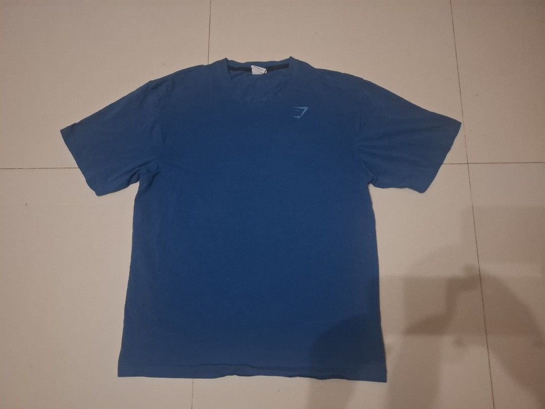 Gymshark power tshirt (Category: Activewear) located in Narvacan. Submitted by jigger85_2ndaccount (Listing ID 1471050320, Image 1). Description: gymshark tshirt like new unisex 9.8/10 condition no issue excellent condition size: medium on tag dimes: 21 1/2 x 28 can fit to medium to large loc. ilocos sur.
