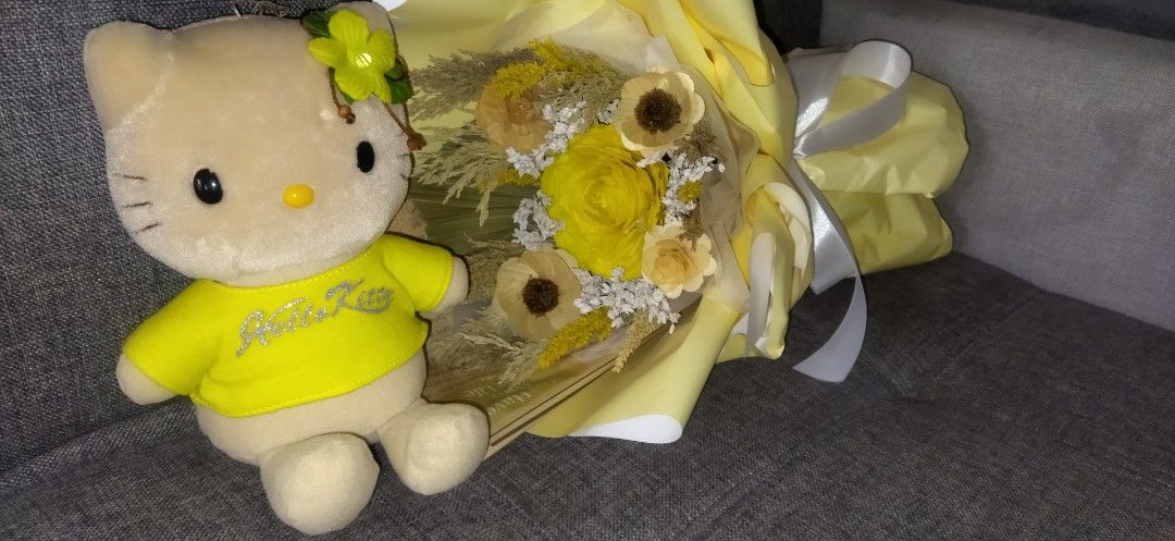Hello Kitty plush toy (Category: Plushies & Soft Toys) located in Santa Cruz. Submitted by madonnaching (Listing ID 1470995864, Image 1). Description: - Authentic Kitty plush doll in a bright yellow sparkly tee with a cute floral accent.