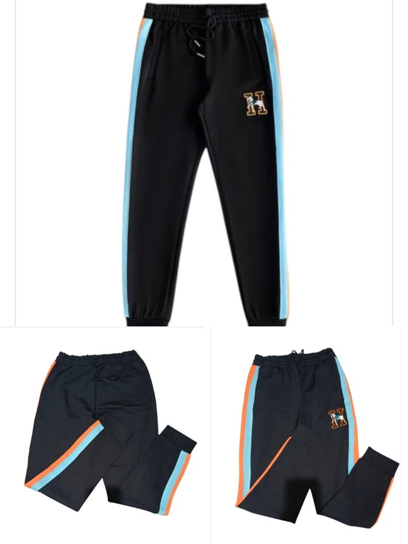 Hermes Black Tracksuit Set with Orange and Blue Stripes (Category: Luxury Apparel) located in Paranaque City. Submitted by calm_youngstore7 (Listing ID 1471009621, Image 3). Description: 50% OFF RETAIL! - Brand: Hermes - Item: Tracksuit set (Zip-up jacket & matching joggers) - Color: Black with striking blue and orange side stripes - Details: Embroidered 'H' logo with horse design on chest and thigh, tags still attached - Features: Full zip front