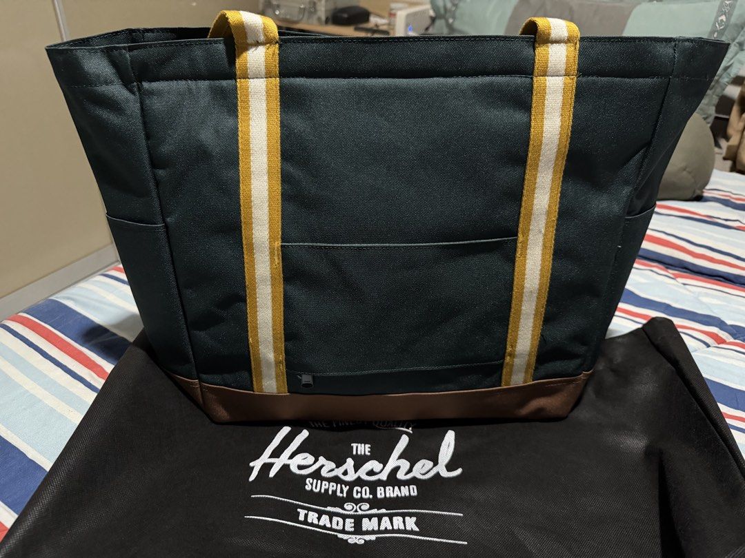 Herschel Heritage Tote - 24.5L (Category: Tote Bags) located in Taguig. Submitted by Zyannah (Listing ID 1471067132, Image 3). Description: Herschel Supply Co. Heritage Tote - 24.5L in the Patches Green Gables colorway. Never been used. Tag still intact. Plus sf.