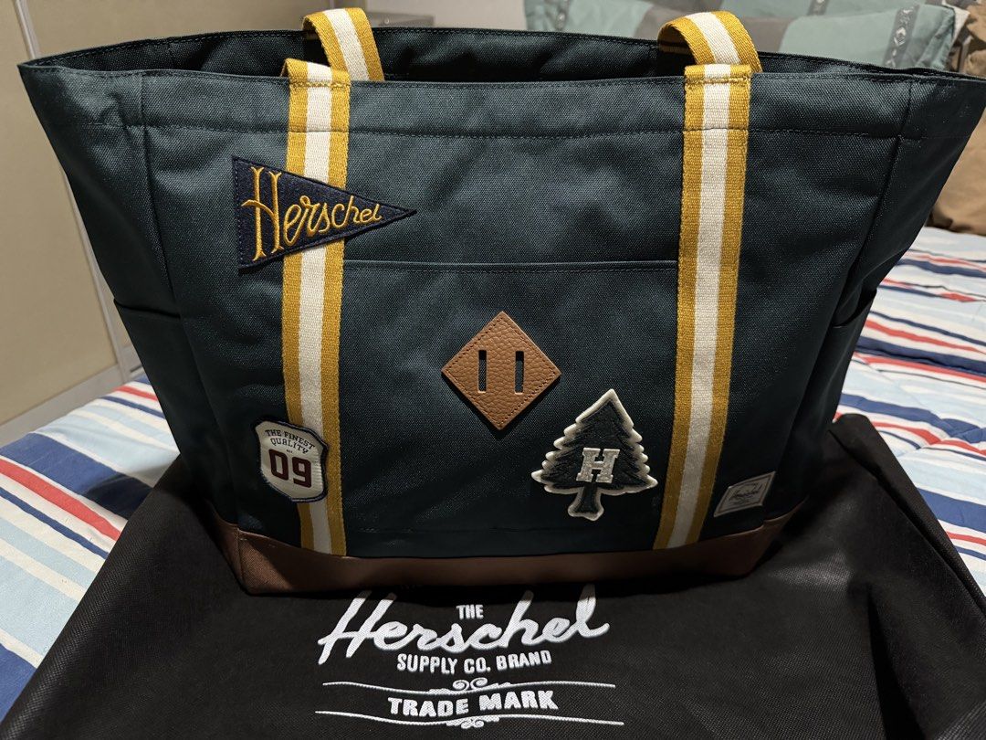 Herschel Heritage Tote - 24.5L (Category: Tote Bags) located in Taguig. Submitted by Zyannah (Listing ID 1471067132, Image 2). Description: Herschel Supply Co. Heritage Tote - 24.5L in the Patches Green Gables colorway. Never been used. Tag still intact. Plus sf.