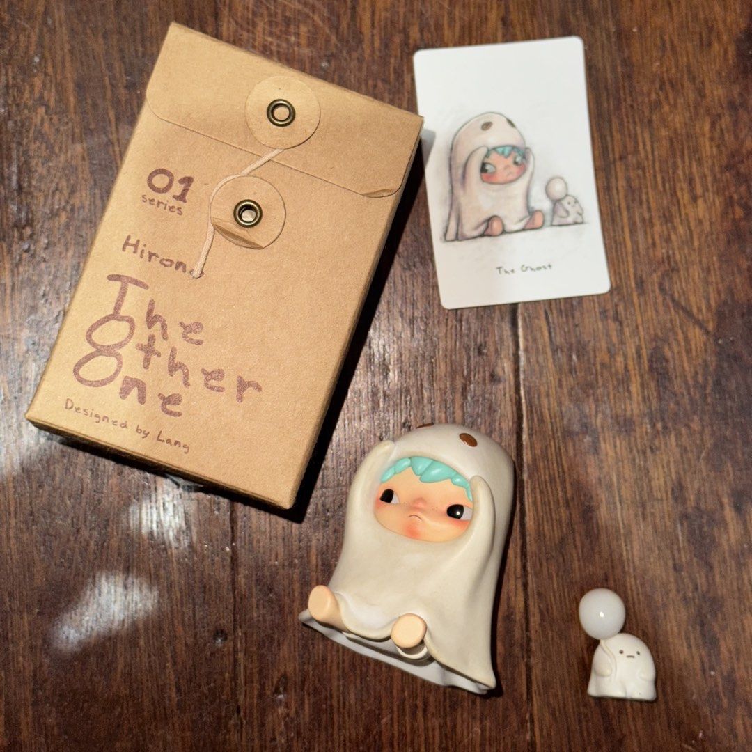 Hirono The Other One Series-The Ghost (Category: Designer & Blind Box Toys) located in Pasig City. Submitted by clarsethsof.ph (Listing ID 1471032365, Image 1). Description: Condition- used naka display lang sa loob ng case -good condition -complete inclusions -opened box (sa bottom part) & unsealed foil rfs: decluttering.