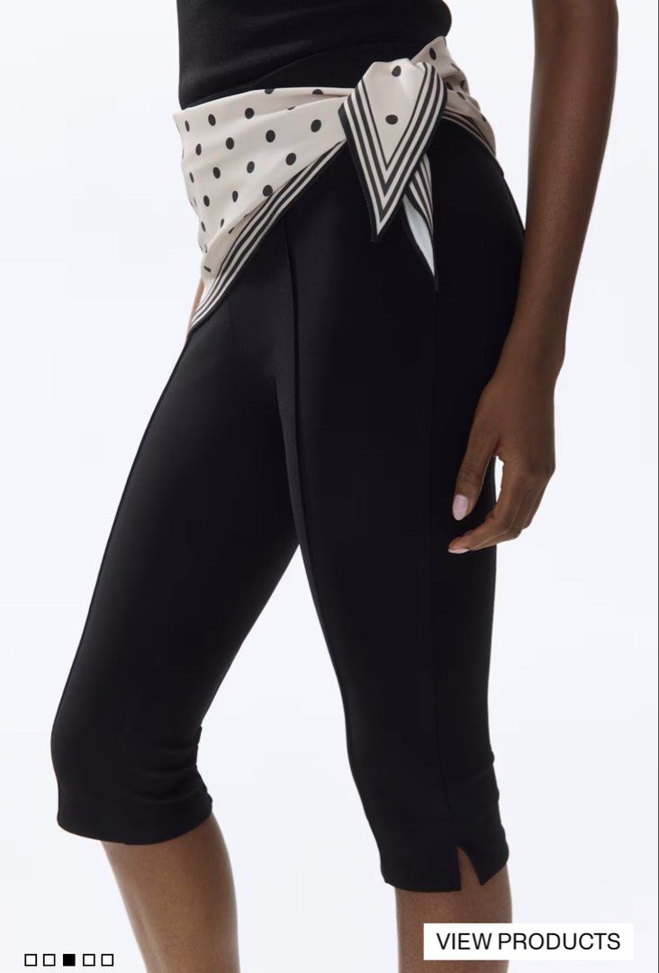 H&M Black Capri with built-in Scarf (Category: Jeans) located in Makati City. Submitted by nomoreclutterph (Listing ID 1471046474, Image 3). Description: - Brand: H&M - Item: Black cropped pants with front seam detailing - Size: Medium (EUR M, US M, CN 165/80A) - Color: Solid black - Condition: Like new/ Used once.