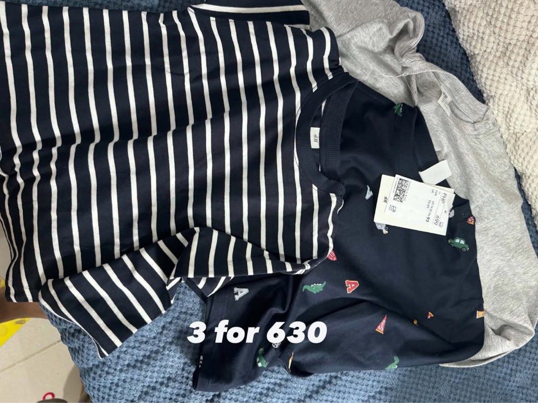 H&M Boys T-Shirt Bundle - 3 Pieces (Category: Babies & Kids Fashion) located in Manila. Submitted by bravepenguin_762c96 (Listing ID 1471011986, Image 1). Description: - Brand: H&M - Item: Toddler t-shirt bundle (set of 3) - Includes: * Black and white striped tee * Plain grey tee * Dark blue tee with all-over dinosaur prints (Brand New with Tags) - Material: Soft and comfortable cotton - Condition: Excellent, great value bundle deal for daily we