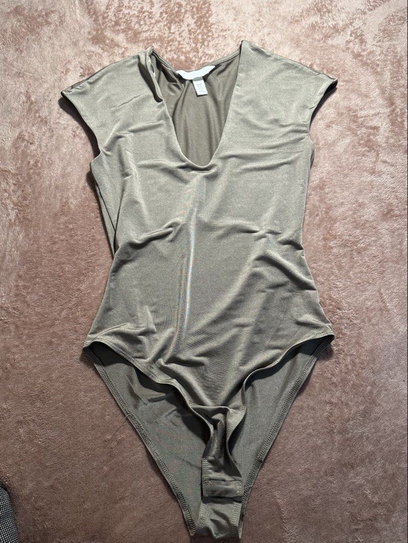 H&M BROWN BODYSUIT (Category: Others Tops) located in Cavite. Submitted by prelovedbyreluv (Listing ID 1471077075, Image 1). Description: .
