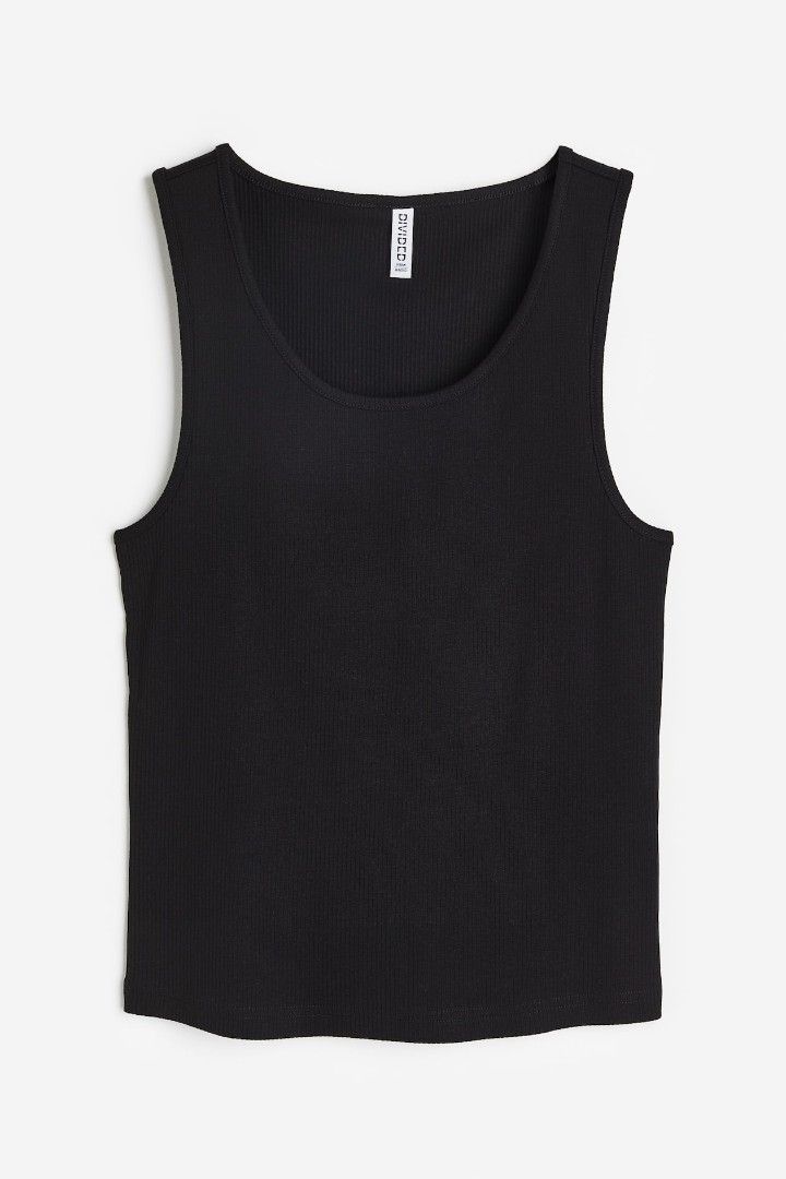 H&M Divided Black Ribbed Tank Top (Category: Sleeveless) located in Quezon City. Submitted by corrnic (Listing ID 1471116830, Image 2). Description: - Brand: H&M Divided - Color: Classic black - Material: Stretchy, comfortable cotton ribbed fabric - Fit: Fitted cut with scoop neckline on front and back - Style: Easy basic piece, perfect for layering or wearing on its own - Condition: Great wardrobe essential.