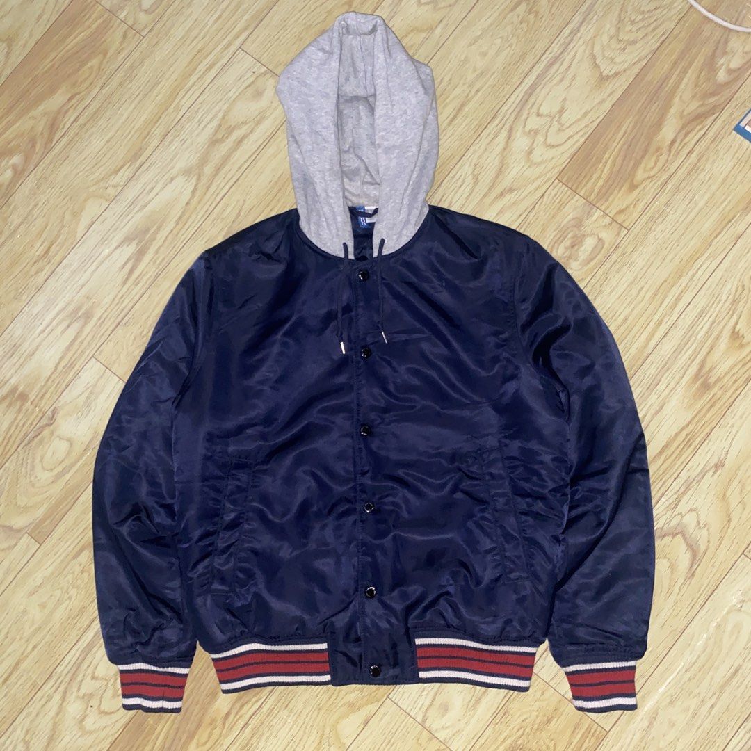 H&M Divided Navy Blue Hooded Varsity Bomber Jacket (Category: Coats, Jackets and Outerwear) located in Aroroy. Submitted by rewear_r3volution (Listing ID 1471074350, Image 1). Description: Size Medium on tag Color: 10/10 Issues: N/A Dimensions: .