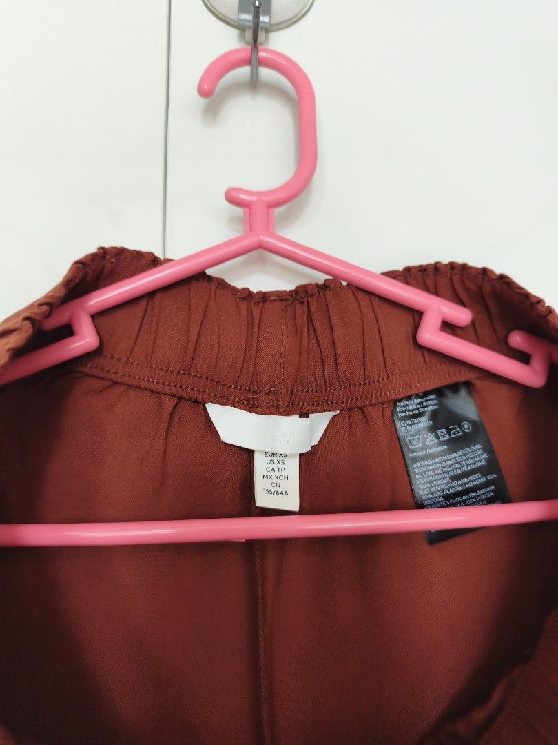 H&M Rust Wide Leg Pants (Category: Other Bottoms) located in Manila. Submitted by smilefashion08 (Listing ID 1470941814, Image 3). Description: Original H&M Waist 25-26 Length 34.