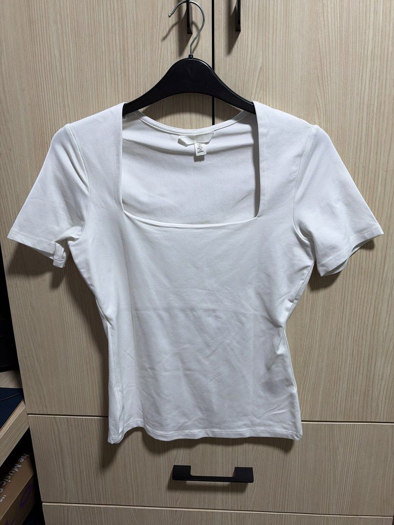 H&M White Square Neck Short Sleeve Top (Category: Shirts) located in Makati City. Submitted by rmgcloset (Listing ID 1471116401, Image 1). Description: - Brand: H&M - Style: Short sleeve top with square neckline - Fit: Fitted cut through the body - Size: S (fits true to size) - Condition: Clean, fresh, and ready to wear.