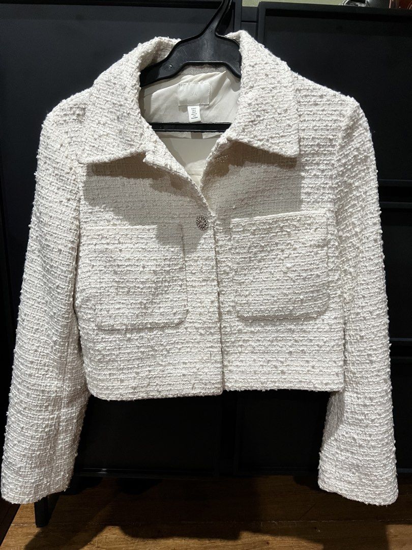 H&M White Tweed Crop Jacket (Category: Coats, Jackets and Outerwear) located in Manila. Submitted by charmssin75605 (Listing ID 1471075877, Image 1). Description: - Brand/Item: H&M White Tweed Crop Jacket - Design: Structured collar and front button closure with sparkly button details - Pockets: Dual chest pockets - Interior: Fully lined for comfort - Style: Chic, textured, and perfect for layering.