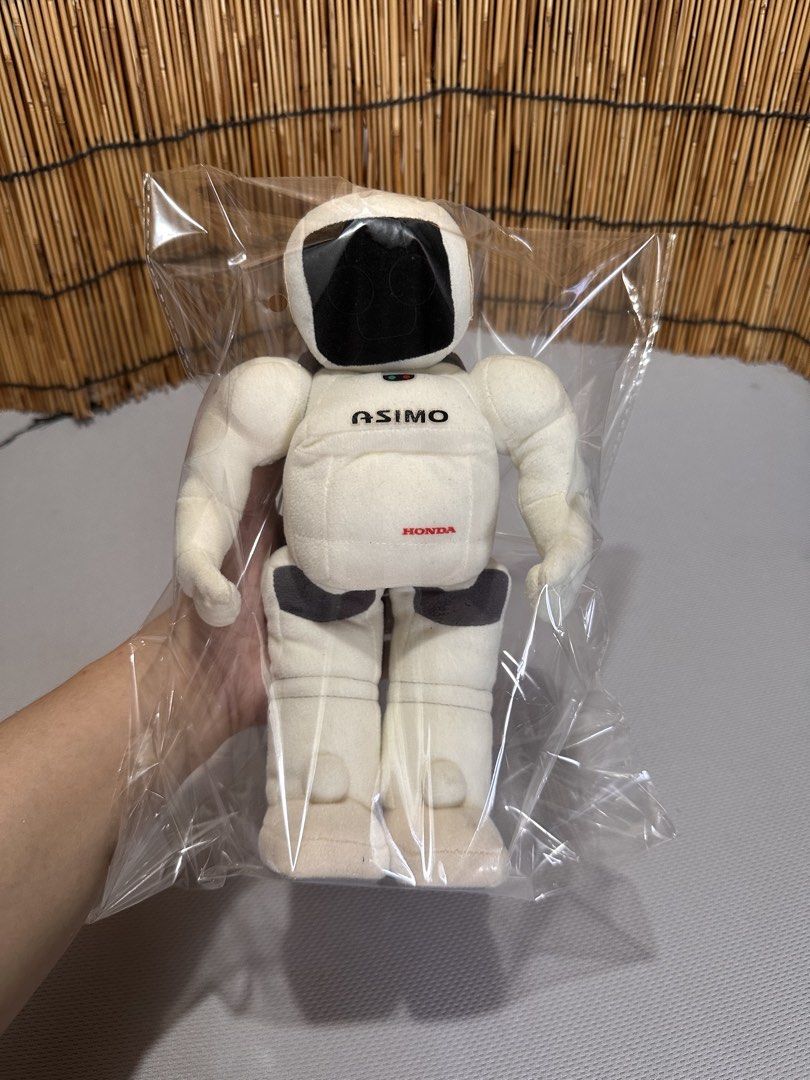 Honda ASIMO Robot Articulated Plush Toy (Category: Plushies & Soft Toys) located in Manila. Submitted by konami_bjork (Listing ID 1471115556, Image 1). Description: - Official Honda ASIMO robot plush toy in classic white and black - 🤩🇯🇵 from Japan Box - Stands upright on its own for easy display -₱2,500 only negotiable .