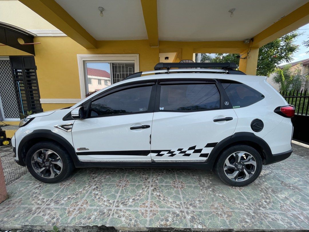 Honda BR-V (Category: Used Cars) located in Davao. Submitted by baste.seb (Listing ID 1471067713, Image 2). Description: 🚗 FOR SALE: 2019 Honda BR-V 1.5 V (Top Variant) 7-seater MPV in Pearl White. Drives like new. Fresh 60k KM major maintenance done! Worry-free. • 61,xxx KM Genuine Mileage • CVT Auto + Paddle Shifters, Sport/Eco • Premium Leather Seats (7-Seater) • New Tires, Battery, Shocks, Stabilizer Links, Drive Shafts, Filters & Oils ⚠️ Co