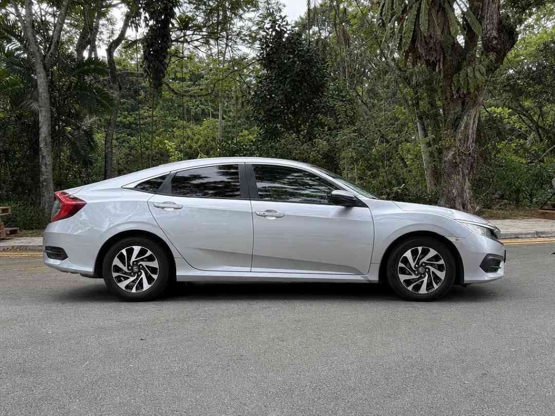 Honda Civic 1.6 i-VTEC (A) (Category: Used Cars) located in Singapore. Submitted by carousell_certified_partners (Listing ID 1470167332, Image 2). Description: Back from popular demand! Rare 1 owner well maintained unit! Engine and gearbox warranty for a peace of mind purchase! Well maintained unit with no major repairs needed! Most sought sedan with a sporty design well known for its good reliability and low running costs! Flexible financing ava