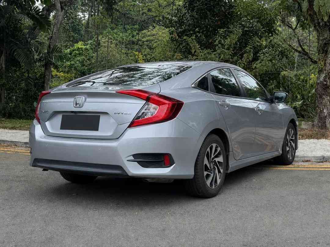 Honda Civic 1.6 i-VTEC (A) (Category: Used Cars) located in Singapore. Submitted by carousell_certified_partners (Listing ID 1470167332, Image 3). Description: Back from popular demand! Rare 1 owner well maintained unit! Engine and gearbox warranty for a peace of mind purchase! Well maintained unit with no major repairs needed! Most sought sedan with a sporty design well known for its good reliability and low running costs! Flexible financing ava