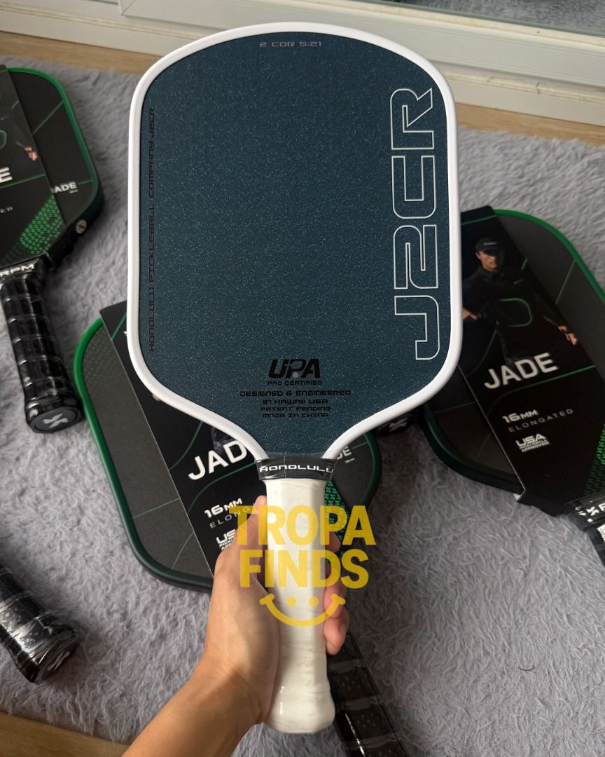 Honolulu J2CR Pickleball paddle (Category: Racket and Ball Sports) located in Manila. Submitted by frncsanne (Listing ID 1471037127, Image 1). Description: Selling Honolulu Pickleball Company J2CR paddles (textured blue face with white or blue grip) WITH FREEBIES Original and brand new.