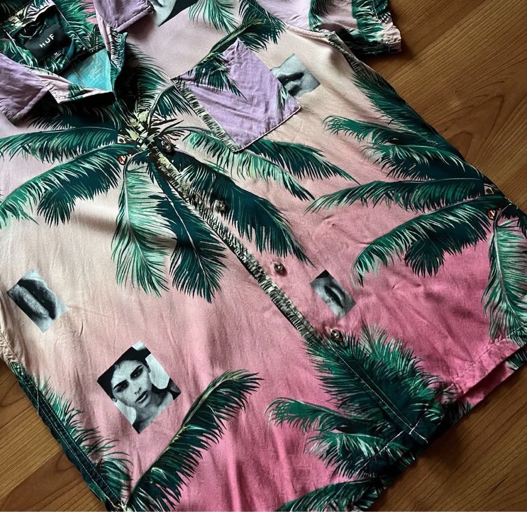 Huf Hawaiian Polo (Category: Tshirts & Polo Shirts ) located in Caloocan City. Submitted by landcruiser76__ (Listing ID 1471078030, Image 2). Description: - Brand: HUF - Style: Short sleeve button-up with Cuban collar and single chest pocket - Design: Unique pink and green palm tree graphic print mixed with edgy face photo details - Material: 100% rayon (super soft, lightweight, and breathable) - Size: Medium (tag on collar) - Extras: Extra butto
