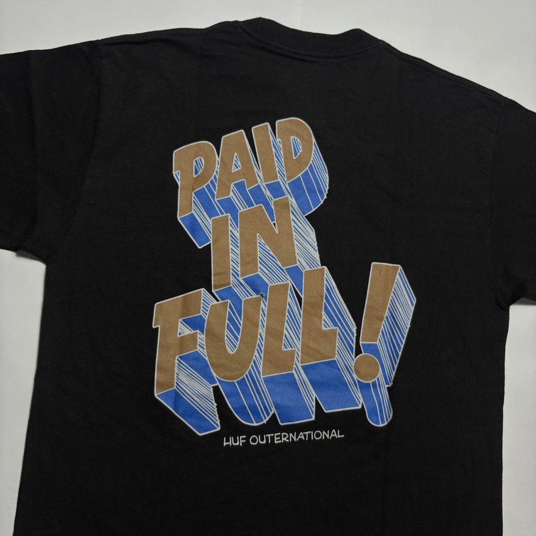 HUF Paid in Full Black Graphic Tee (Category: Tshirts & Polo Shirts ) located in San Fernando. Submitted by lumang_gamit (Listing ID 1471058929, Image 3). Description: - Brand: HUF - Color: Black - Condition: Clean, vibrant prints - Design: Front text graphics (Down By Law, Devastating, Thinkin of a Master Plan) and large back 'Paid In Full' 3D graphic - Fit/Style: Short sleeves, crew neck, comfortable streetwear basic.