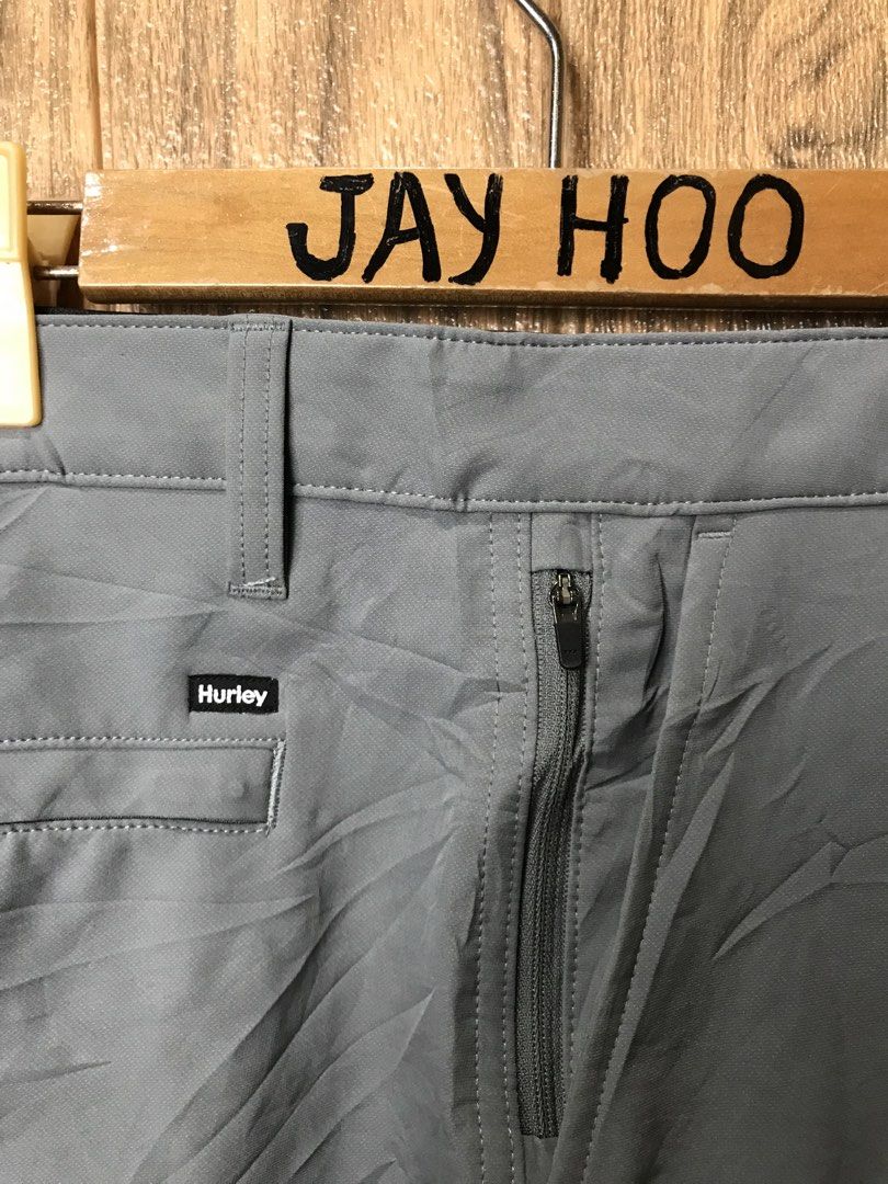 Hurley Grey Board Shorts Size 36 (Category: Swim Trunks & Board Shorts) located in Aloguinsan. Submitted by jayhooukay (Listing ID 1471032833, Image 2). Description: - Brand: Hurley - Item: Board shorts - Color: Grey - Size: 36 - Origin: Made in Bangladesh - Waistband: Elastic with Hurley branding and zip fly - Pockets: Back pocket with logo tag - Lining: Inside mesh lining - Fabric: Lightweight.