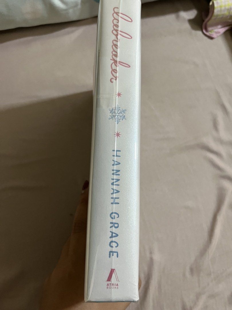 Icebreaker by Hannah Grace Special Edition (Category: Storybooks) located in Davao. Submitted by trissiea (Listing ID 1471054465, Image 2). Description: - Title: Icebreaker by Hannah Grace - Edition: Special Holiday Edition with exclusive snowflake cover & pink accents - Publisher: Atria Books - Features: Stunning pink and blue sprayed edges - Condition: Brand new, still sealed in original plastic shrink wrap - Ships securely from a trusted selle