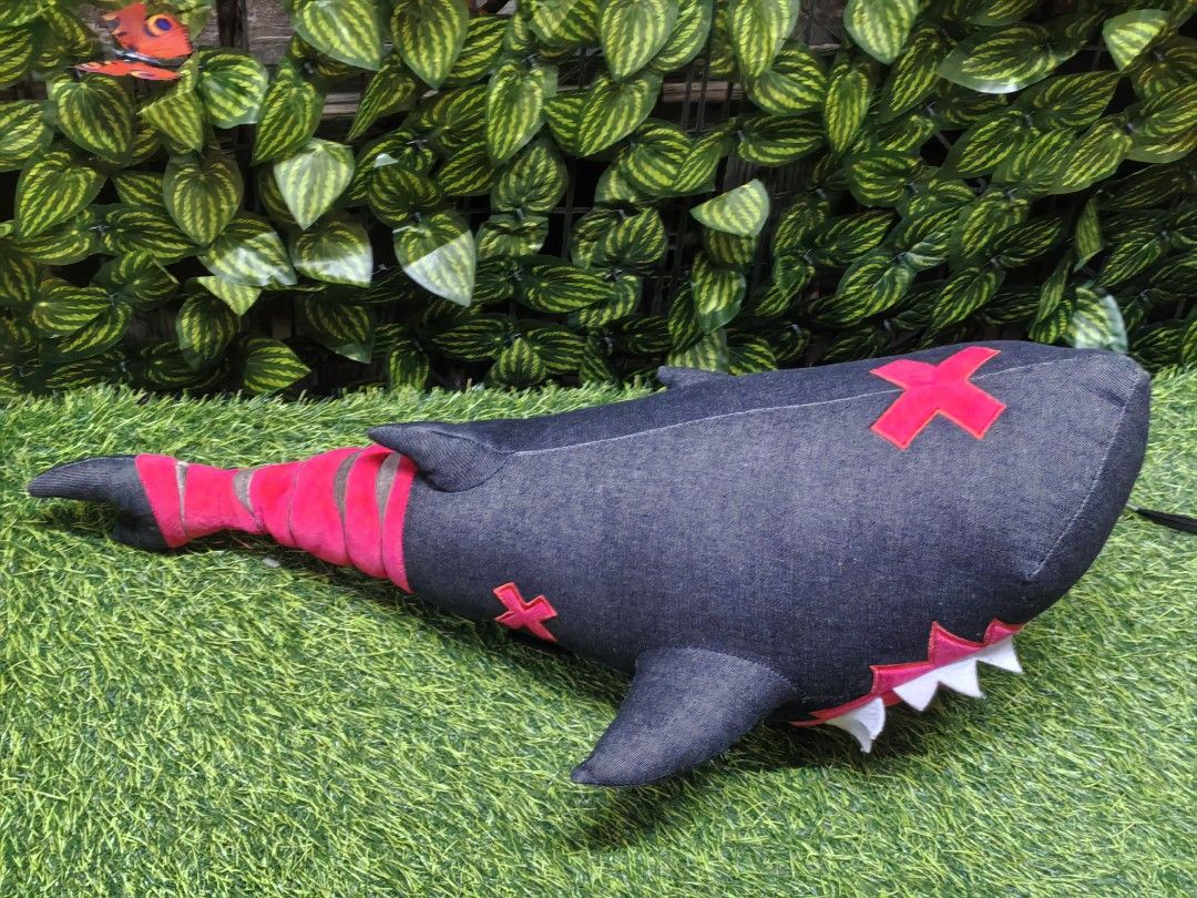 Identity V Shark Plush Toy approx 60cm (Category: Plushies & Soft Toys) located in Paranaque City. Submitted by furugiyafinds (Listing ID 1471056232, Image 1). Description: - Official Identity V shark plush merchandise - Dark grey denim body with vibrant pink and white details - Signature cross stitching on the side and tail - Features clean official fabric tag - Great collectible item for fans of the game.