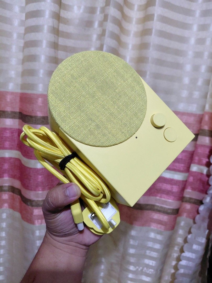Ikea Nattbad bluetooth speaker (Yellow) (Category: Soundbars, Speakers & Amplifiers) located in Urdaneta. Submitted by prelovedandfound (Listing ID 1471003555, Image 1). Description: Good as new No flaws Superb sound In yellow. It features a minimalist, retro-inspired aesthetic with a fabric cover and a rounded top. Location: Urdaneta Pangasinan.