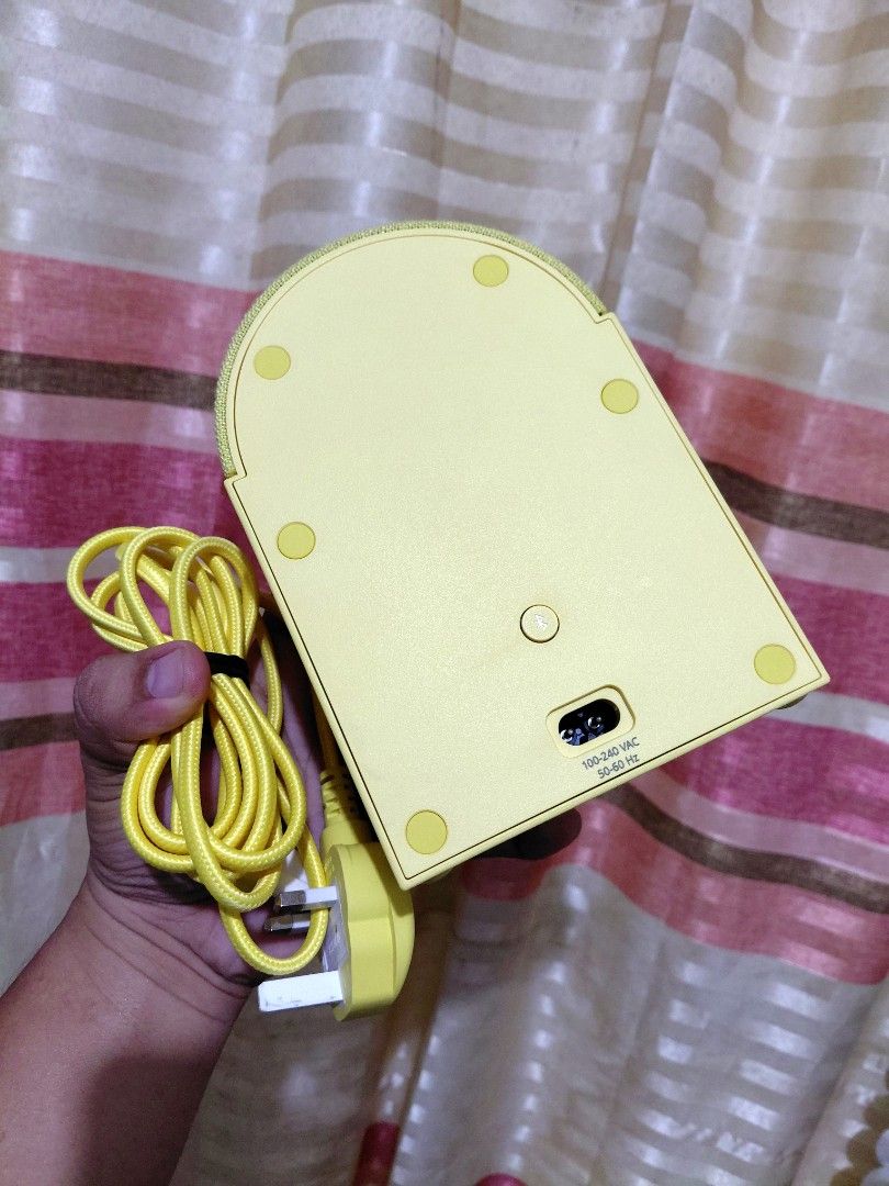 Ikea Nattbad bluetooth speaker (Yellow) (Category: Soundbars, Speakers & Amplifiers) located in Urdaneta. Submitted by prelovedandfound (Listing ID 1471003555, Image 2). Description: Good as new No flaws Superb sound In yellow. It features a minimalist, retro-inspired aesthetic with a fabric cover and a rounded top. Location: Urdaneta Pangasinan.